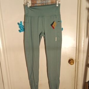 Woman's Reebok workout pants. Some kind of green new with tags.